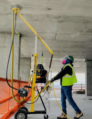 Northrock concrete ceiling grinder used for overhead surface preparation